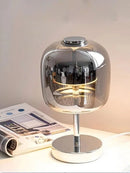 Smoked glass table lamp and pendant light with modern design and elegant finish