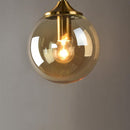 smoked Glass Torch Brass Wall Light