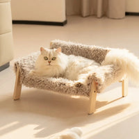 Elevated wooden pet bed checkered fabric cozy modern stylish