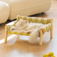Elevated wooden pet bed checkered fabric cozy modern stylish