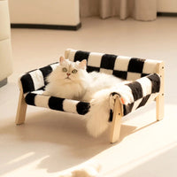 Elevated wooden pet bed checkered fabric cozy modern stylish