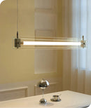 Modern pendant light fixture in a minimalistic room setting