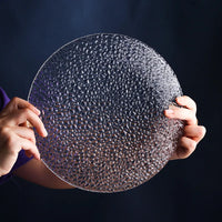 Elegant embossed round dinner plate for serving textured clear plate