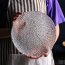 Elegant embossed round dinner plate for serving textured clear plate