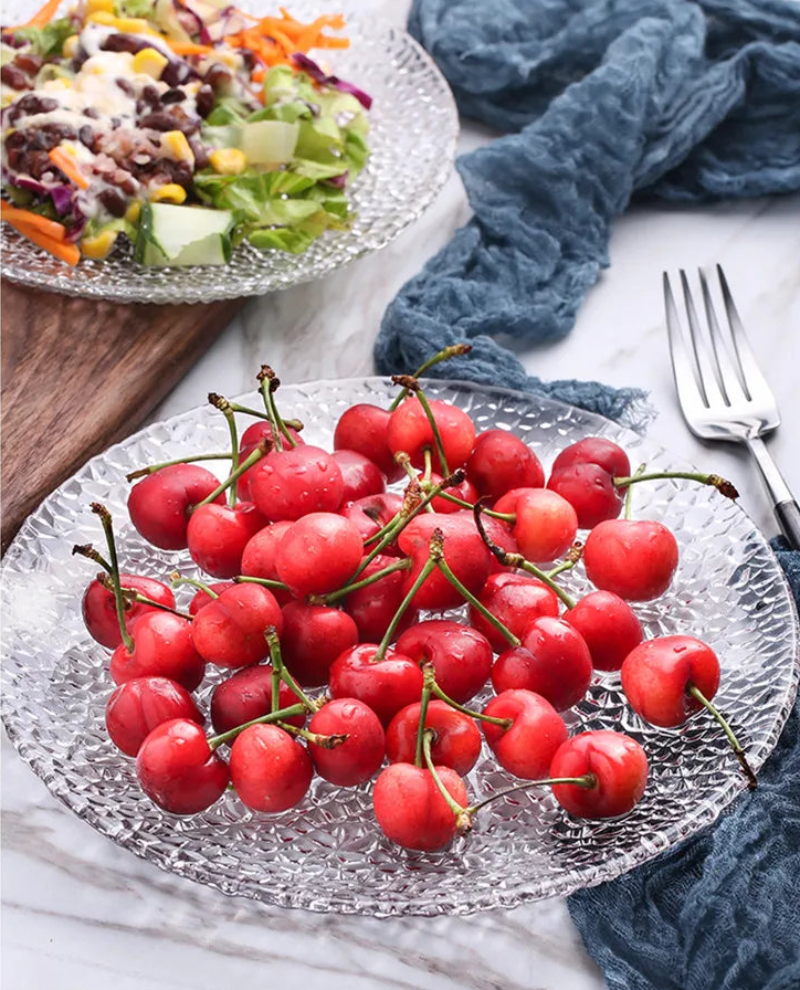 Elegant embossed round dinner plate for serving textured clear plate