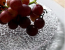 Elegant embossed round dinner plate for serving textured clear plate