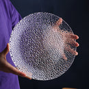 Elegant embossed round dinner plate for serving textured clear plate