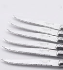 Elegant stainless steel flatware set with a polished finish, ergonomic handles, and precision steak knives
