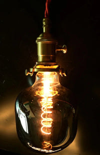 Letifly Lights & Decor - The Smoke Spiral Filament Bulb - Mirror gray LED filament bulb with decorative spiral filament and warm ambient glow