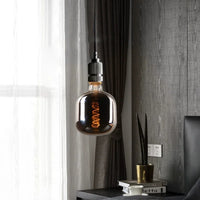 Letifly Lights & Decor - The Smoke Spiral Filament Bulb - Mirror gray LED filament bulb with decorative spiral filament and warm ambient glow