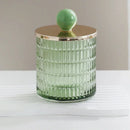 Textured glass canister with colorful knob and metal lid storage jar