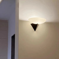The Horizon Mount Modern glass wall lamp with black triangular mount ambient hallway lighting