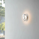 Modern round crystal LED wall sconce clear glass chrome mirror finish minimalist Italian lighting