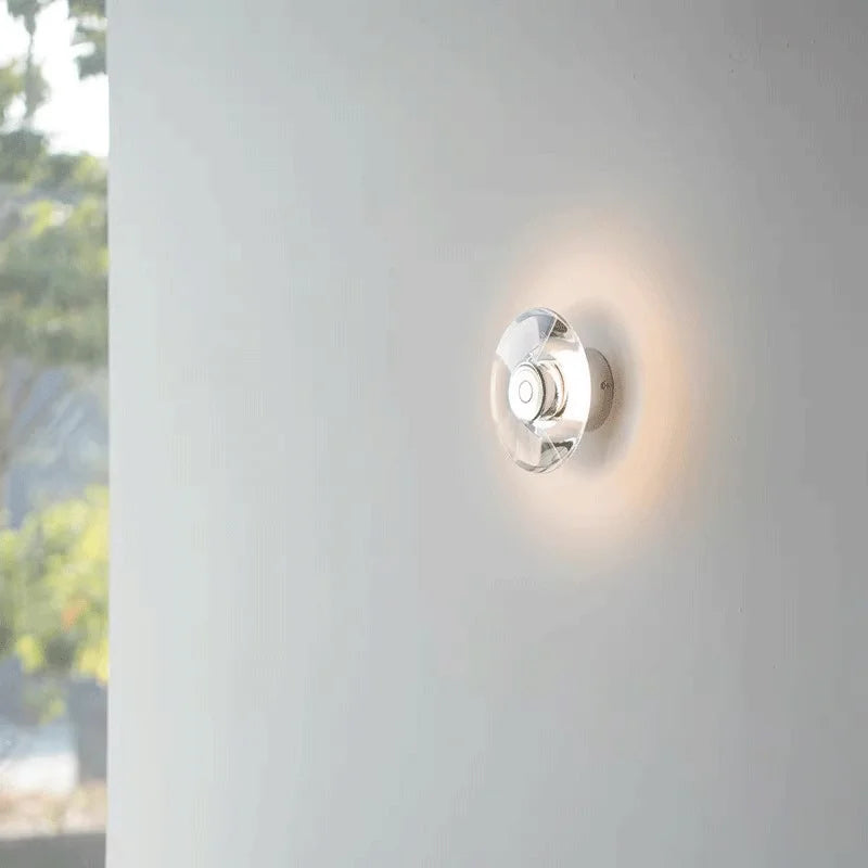 Modern round crystal LED wall sconce clear glass chrome mirror finish minimalist Italian lighting