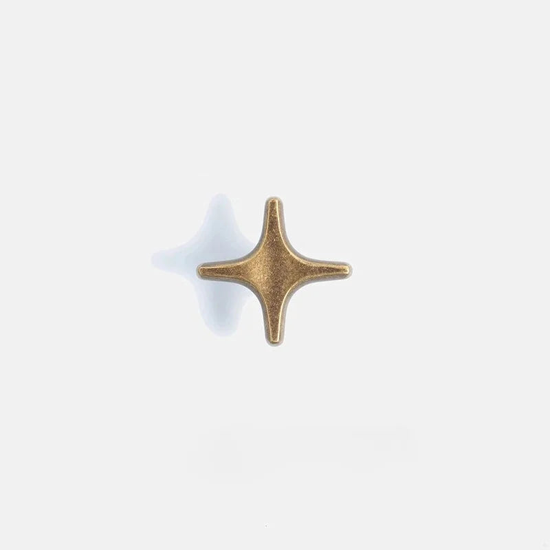 The Crossbeam Brass Knobs Antique brass star-shaped cabinet knobs 1-star and 3-star Nordic hardware
