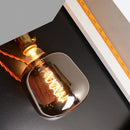 Letifly Lights & Decor - The Smoke Spiral Filament Bulb - Mirror gray LED filament bulb with decorative spiral filament and warm ambient glow