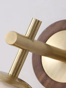 The Aurelia Sconce Walnut wood wall sconce with ribbed glass shade modern retro bedside light