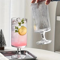 Footed glass cup vertical ribbed clear tall pedestal iced coffee juice cocktail wine elegant