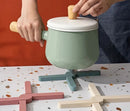 Foldable silicone heat resistant Crossfold Coaster Trivet, non-slip pot pan mat and coaster set in modern multi-color shades for kitchen table protection