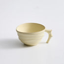 Ceramic ridged coffee mug warm brown textured tea cup sculptural handle minimalist drinkware