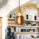 Letifly Lights & Decor - The Smoke Spiral Filament Bulb - Mirror gray LED filament bulb with decorative spiral filament and warm ambient glow