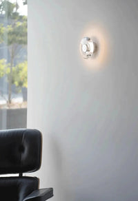 Modern round crystal LED wall sconce clear glass chrome mirror finish minimalist Italian lighting
