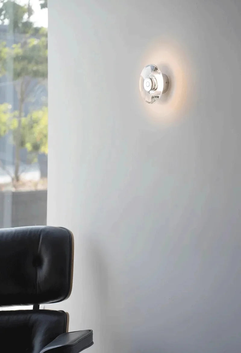 Modern round crystal LED wall sconce clear glass chrome mirror finish minimalist Italian lighting