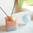 Pastel colored glass bud vase sealed lid sculptural aromatherapy flower diffuser container