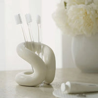 sculpted knot ceramic holder for vanity, bathroom and home decor