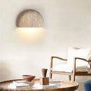 stone textured basin wall light sculptural wall sconce warm ambient lighting modern minimalist wall lamp