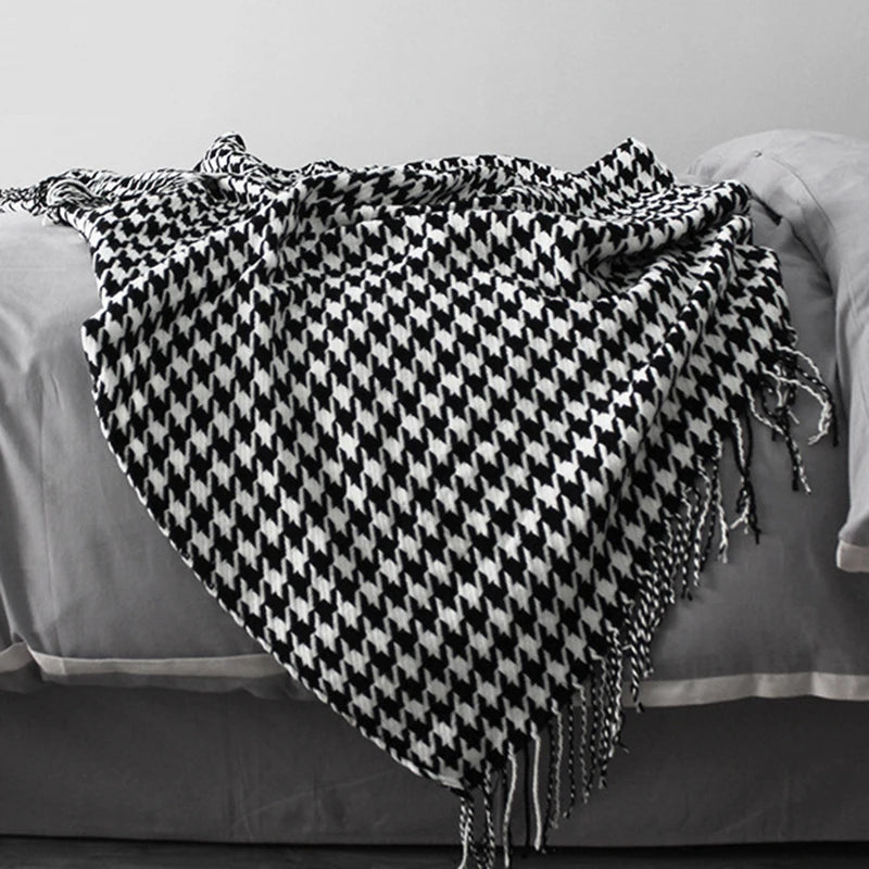 Vintage geometric knitted throw blanket with tassels in houndstooth and grid patterns