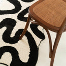 Black Swirl Shaped Area Rug