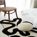 Black Swirl Shaped Area Rug