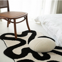 Black Swirl Shaped Area Rug
