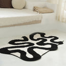 Black Swirl Shaped Area Rug