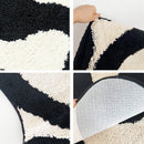 Black Swirl Shaped Area Rug