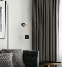 Round Polished Black Iron Wall Light