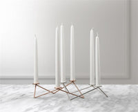 Metal candle holder for three candles