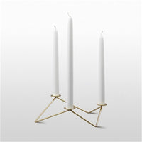Metal candle holder for three candles