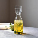 elongated clear glass pitcher