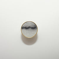 round color marbled brass cabinet knob and pulls