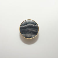 round color marbled brass cabinet knob and pulls