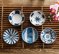 white and blue Nori Porcelain sauce dish