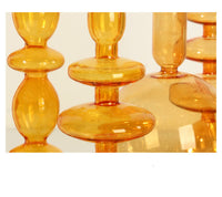 abstract blown glass orange candle holders