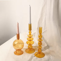 abstract blown glass orange candle holders