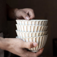 round scalloped textured edge ashy white ceramic bowl
