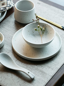 Fine porcelain ceramic White with black flecks dinner plates and bowls