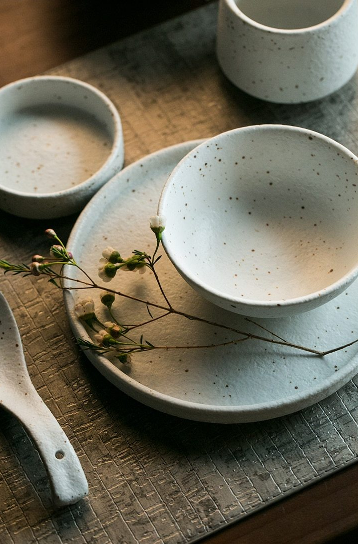 Fine porcelain ceramic White with black flecks dinner plates and bowls