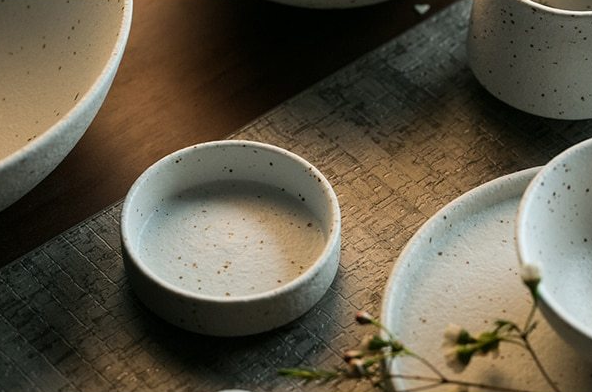 Fine porcelain ceramic White with black flecks dinner plates and bowls