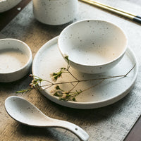 Fine porcelain ceramic White with black flecks dinner plates and bowls